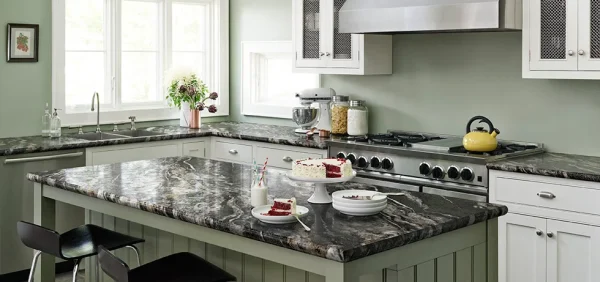 a kitchen with a marble counter top